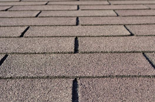 Construction: Detail of shingles on house rooftop.