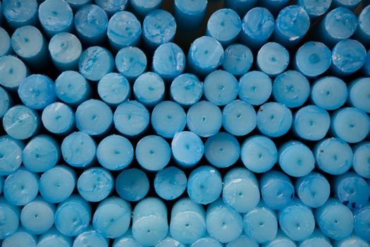 Blue circle candles in Lourdes in France.