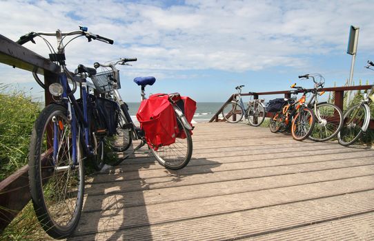 Sporty bicycles at the entrance to the beach