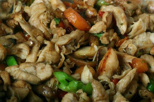 Chinese wok food with chicken and vegetables