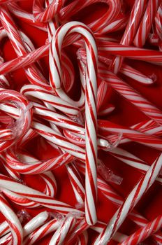 Red christmas background with traditional candy canes