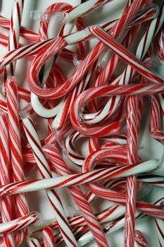 Sweet christmas background with all kinds of candy canes