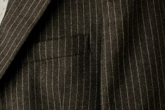 Close-up of a new business suit focusing on the chest pocket