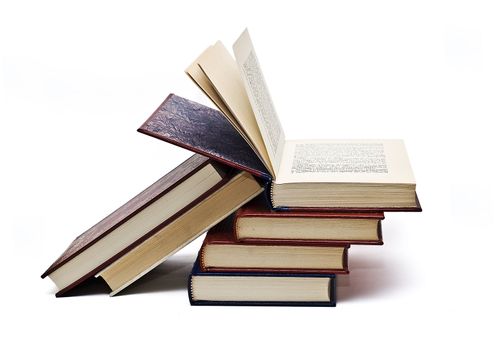 Some old books isolated on white background.