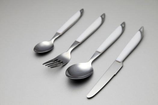 cutlery set on the plain color background