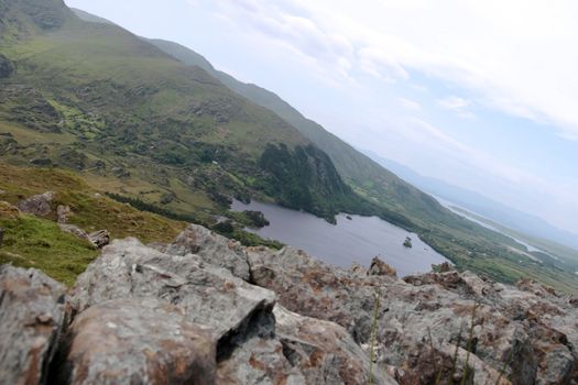 an evenings view of winding roads through the mountains of kerry