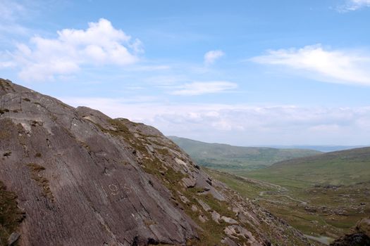 an evenings view of winding roads through the mountains of kerry