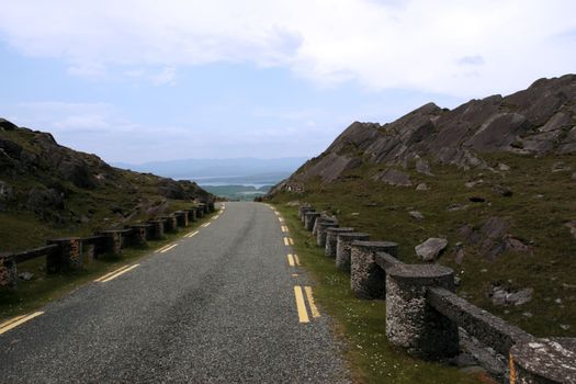an evenings view of winding roads through the mountains of kerry