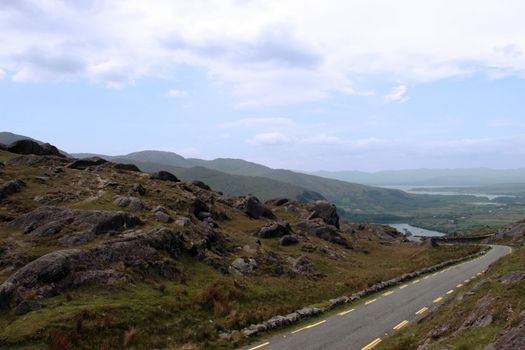 an evenings view of winding roads through the mountains of kerry