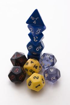 stack of multicolored dice use for role playing games