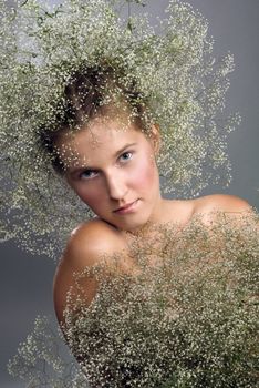 portrait ov beautiful slavic young girl with wreath