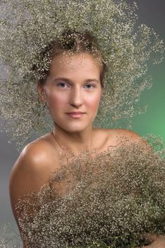 portrait of beautiful slavic young girl with wreath