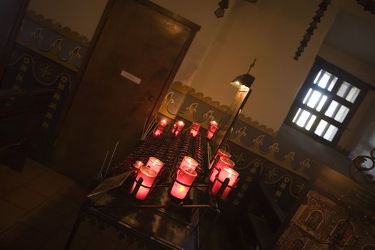 Candles light up the Chapel at Mission San Juan Capistrano