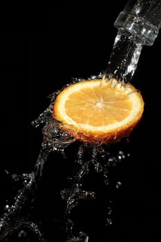 The water which is flowing down from segments of fruit
