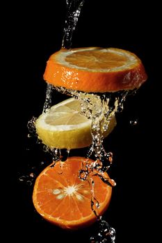 The water which is flowing down from segments of fruit
