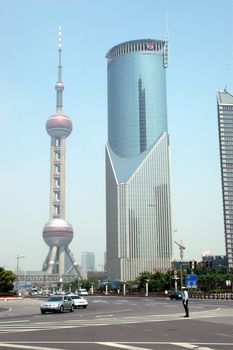 Pudong area in Shanghai with modern skyscrapers and famous Orient Pearl TV tower.