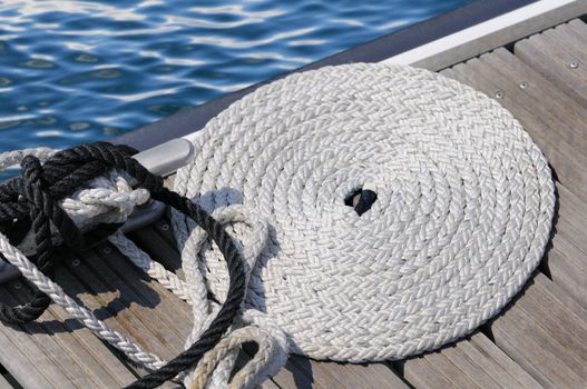 Bitt with coiled rope on a jetty