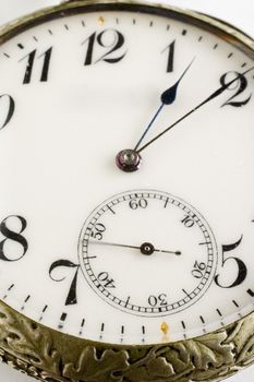 Close up shot of an old pocket watch