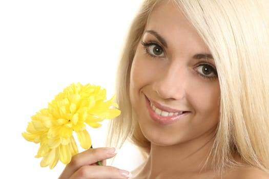 Portrait of the beautiful girl with a flower
