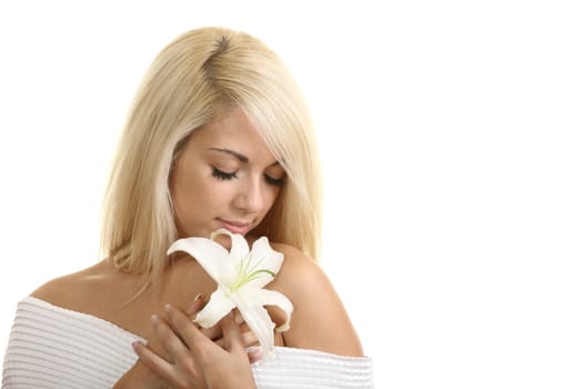 Portrait of the beautiful girl with a flower
