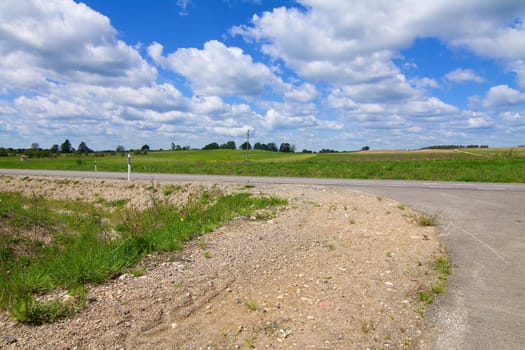 Green meadows to the road