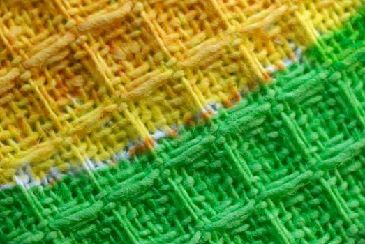macro pattern of yellow - green textile fabric