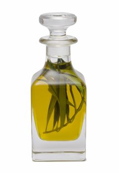 Olive oil bottle witn olives and olive branches isolated on white background.