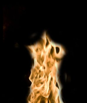 Flames of Fire in a Fireplace against a black Background 