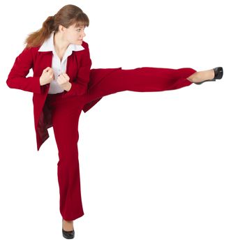 Young girl kicks, isolated on a white background