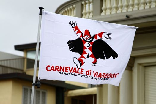 The Burlamacco. Flag represents the carnival of Viareggio 