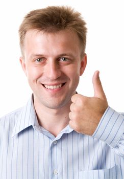 smiling young man with thumbs up on a white background