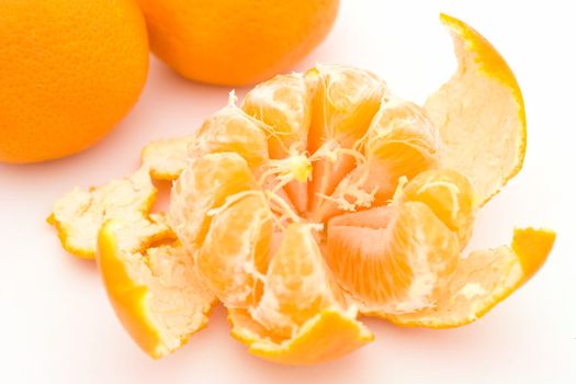 Juicy tangerines on a white background