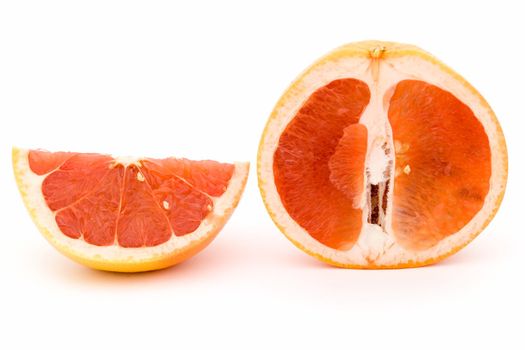 Big ripe grapefruit on a white background