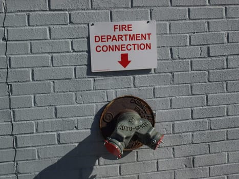Fire plug on the wall in the city
