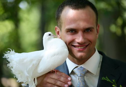 The groom with the pigeon