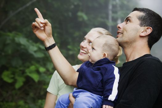 Mixed Hispanic Family with Cute Baby Boy Experienicing Nature in the Rain Forest