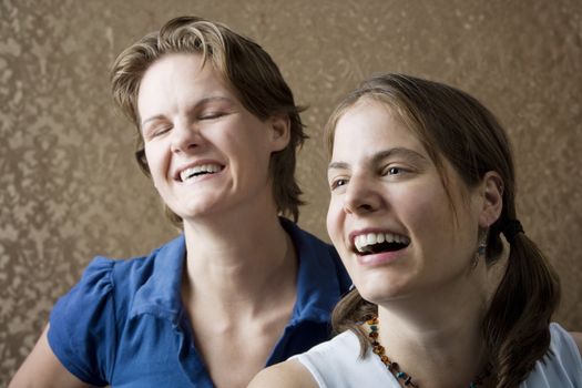 Portrait of Two Young Women Friends Laughing