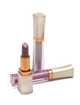 Open lipstick and lip gloss on a white background