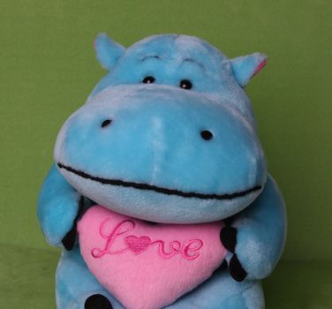 Soft toy hippo with a loving heart 