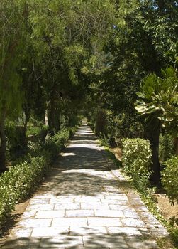 Medieval passage through a garden in Malta