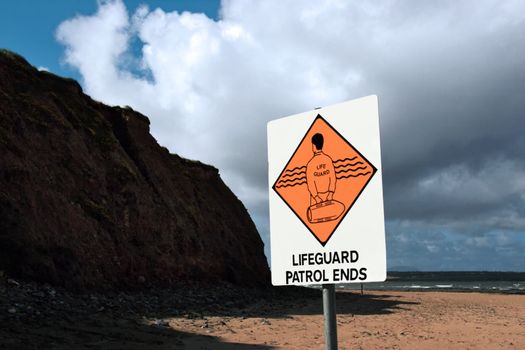 a sign warning that there is no lifeguard patrol beyond this sign