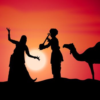 silhouette view of people performing folk dance and music, india