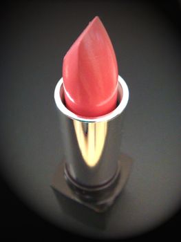 Close up photo from an above angle of a lipstick.