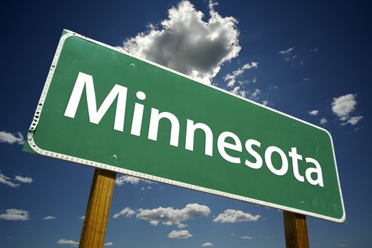 Minnesota Road Sign with dramatic clouds and sky.