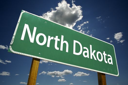 North Dakota Road Sign with dramatic clouds and sky.