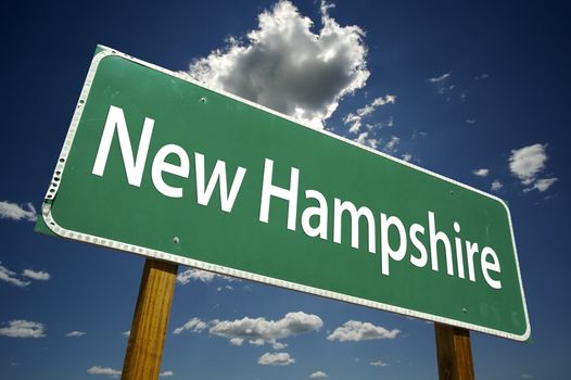 New Hampshire Road Sign with dramatic clouds and sky.