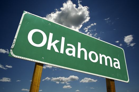 Oklahoma Road Sign with dramatic clouds and sky.