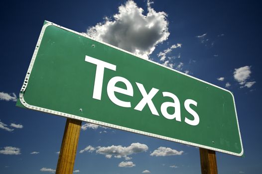 Texas Road Sign with dramatic clouds and sky.