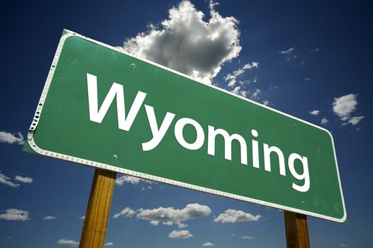 Wyoming Road Sign with dramatic clouds and sky.