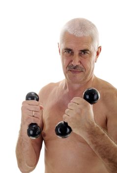 Senior naked man with dumb-bells concentrated face